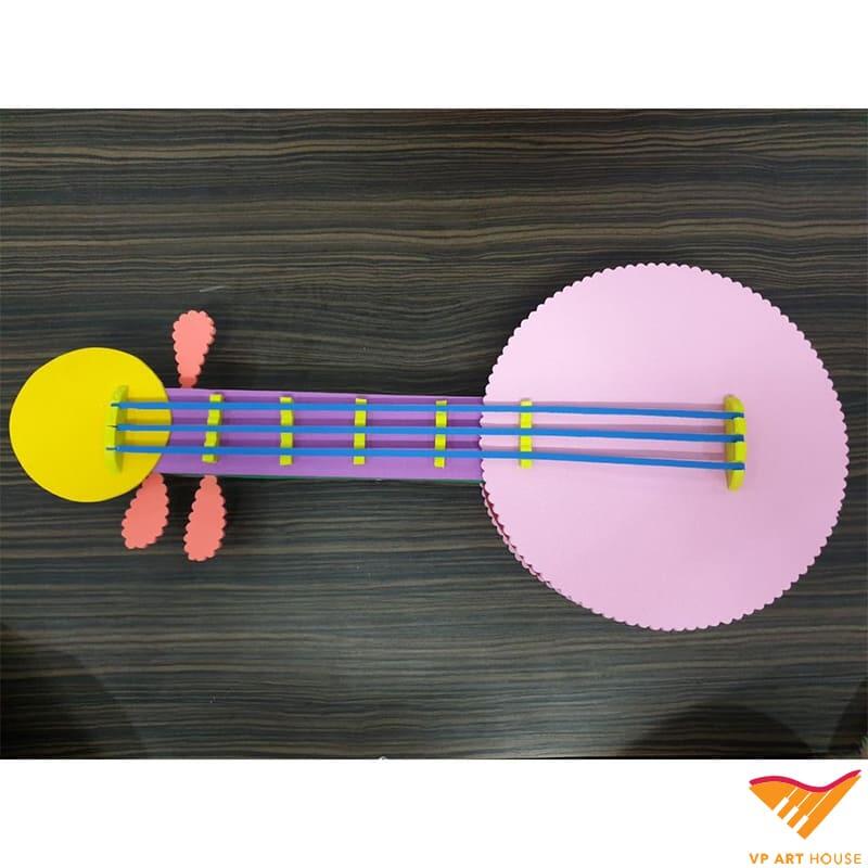 Hướng dẫn làm đàn guitar bằng giấy bạn có thể tham khảo 10 Các bước thực hiện làm đàn guitar bằng giấy
