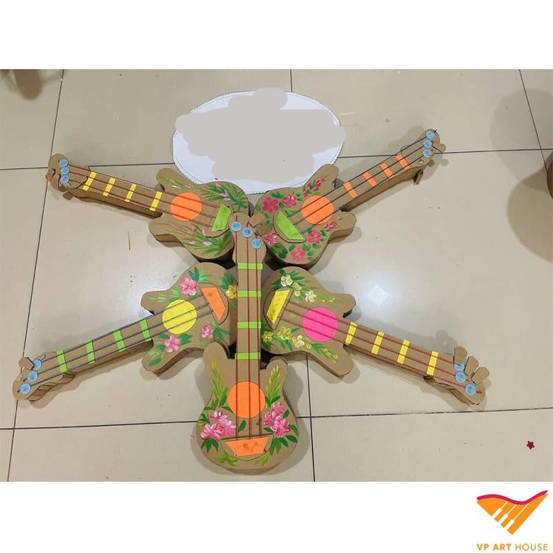 Hướng dẫn làm đàn guitar bằng giấy bạn có thể tham khảo 11 Lắp dây đàn guitar bằng giấy cứng